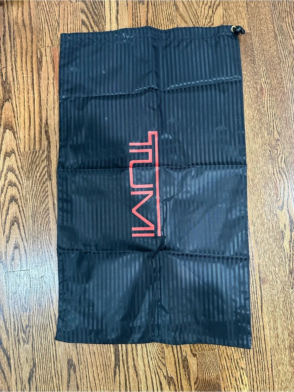 Tumi Black Travel Garment Bag with Dual Front Pockets and Shoulder Strap